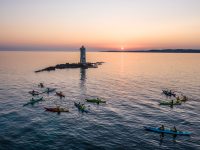 Ziru Tour Kayak - tramonto Faro di Mangiabarche